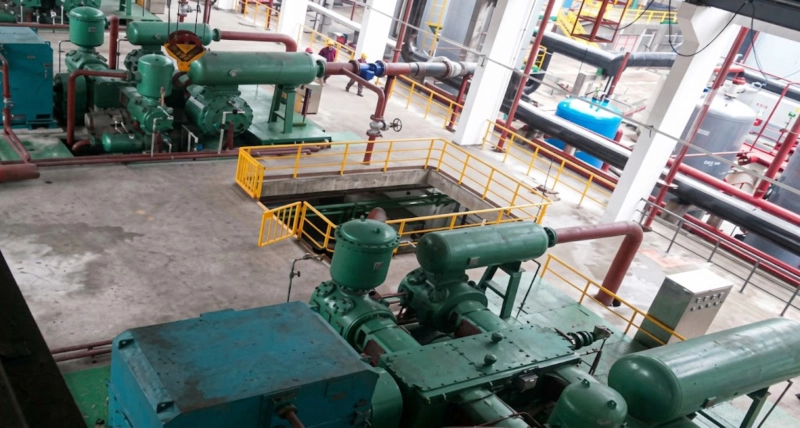 4MW series gas compressor in service at large industrial plant showing four-column machine in CO2 liquefaction or gas transmission duty
