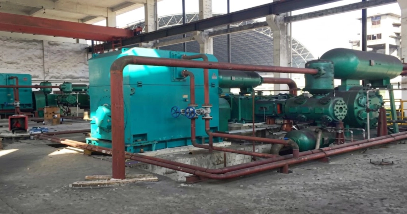 4MW series refrigerant compressor operating at large petrochemical plant or industrial refrigeration facility showing four-column balanced-opposed machine at 1600 to 2300 kW continuous process service Russia